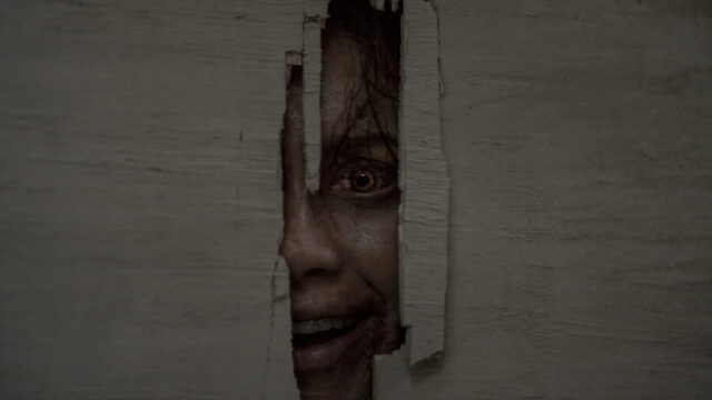 Horror Movie Character Peeking Through Wall Desktop Wallpaper