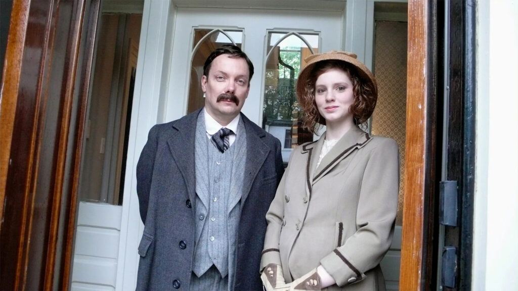 Historical Period Drama Couple Standing in Doorway Desktop Wallpaper