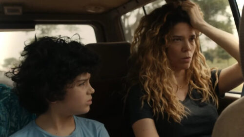 Woman and Boy in Car Cinematic Desktop Wallpaper