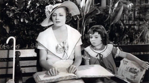 Irene Dunne and child reading a book Desktop Wallpaper