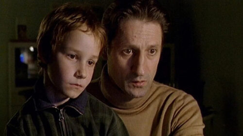 Father and Son Watching Television Desktop Wallpaper