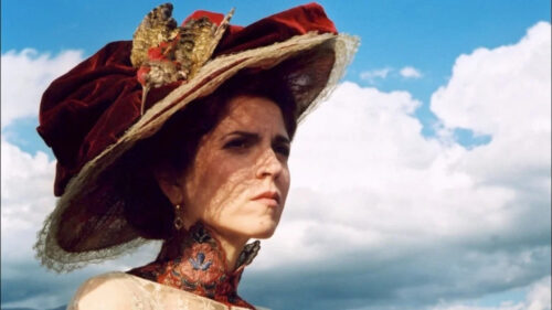 Victorian Era Lady in Elegant Hat Desktop Wallpaper
