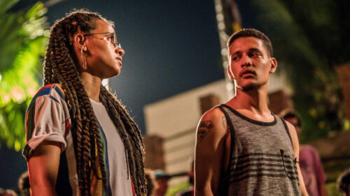 Two Young People Looking at Each Other Desktop Wallpaper