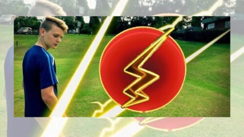 Young Man Standing in Field with Lightning Symbol Desktop Wallpaper