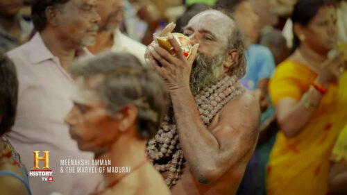 Sadhu Blowing Conch Shell in Madurai Temple Desktop Wallpaper