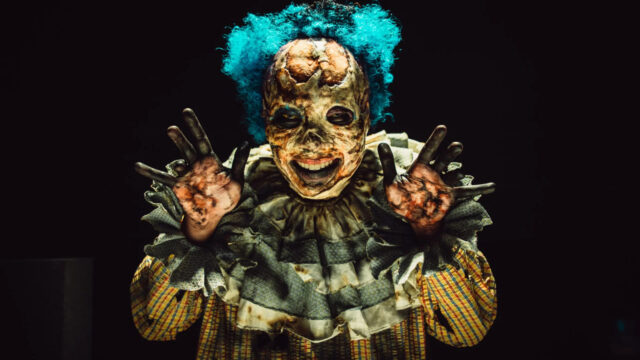 Terrifying Creepy Blue-Haired Clown Horror Desktop Wallpaper