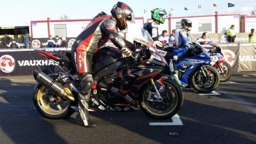 Professional Superbike Racers at the Starting Line Desktop Wallpaper