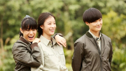 Three Young Women Smiling Outdoors Desktop Wallpaper
