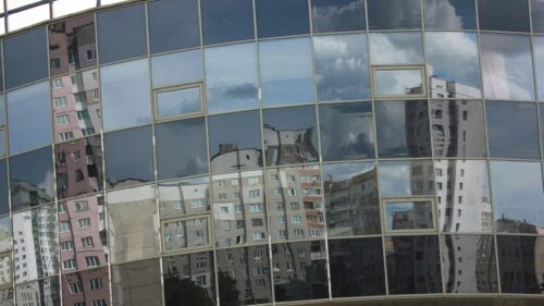 Abstract Skyscraper Glass Facade Reflection 4K Wallpaper