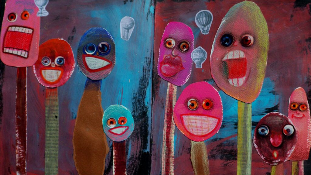Whimsical Collage of Colorful Abstract Faces Art Desktop Wallpaper