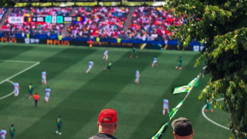 Thrilling Soccer Match View from the Stands 4K Desktop Wallpaper