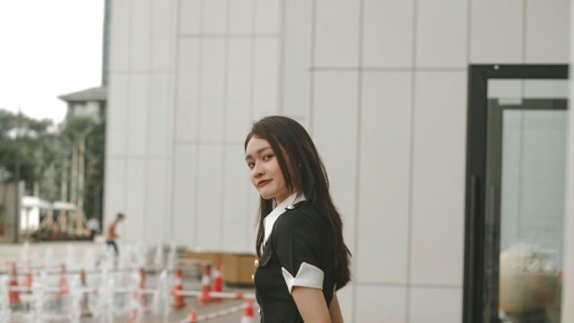 Stunning Young Woman in Elegant Black Fashion Outfit Desktop Wallpaper