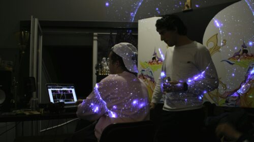 Creative Studio Friends Working on Digital Art Project 4K Wallpaper