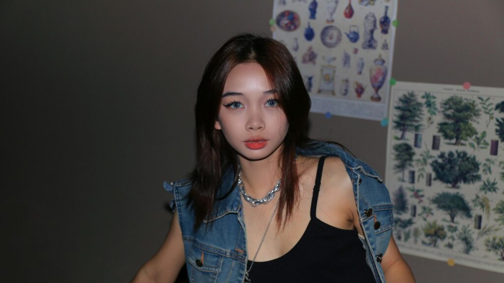 Stylish Asian Girl with Denim Jacket Aesthetic 4K Wallpaper