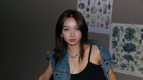 Stylish Asian Girl with Denim Jacket Aesthetic 4K Wallpaper