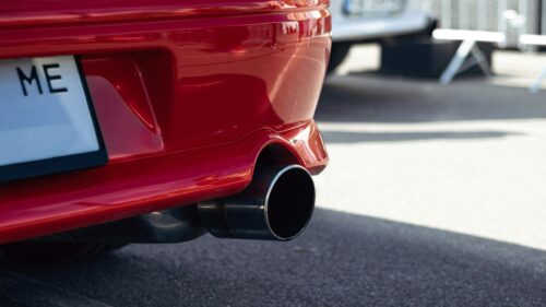 Red Sports Car Exhaust Close-Up Automotive 4K Desktop Wallpaper