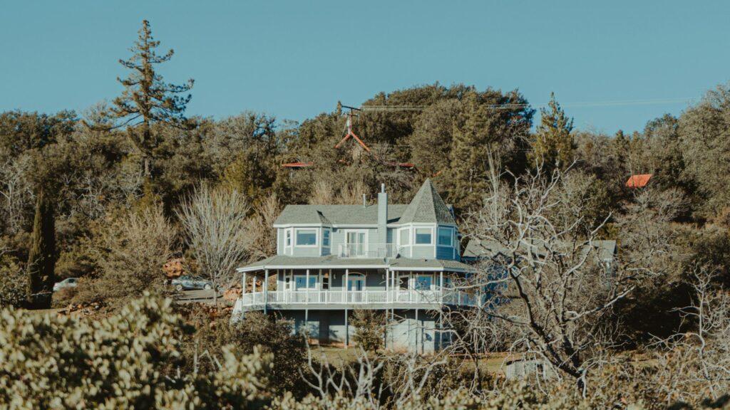 Picturesque Countryside Two-Story Home in the Forest Desktop Wallpaper