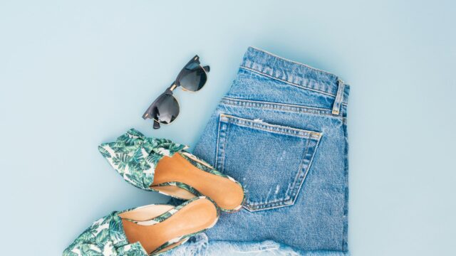 Summer Fashion Flat Lay with Denim Shorts and Tropical Sandals Desktop Wallpaper