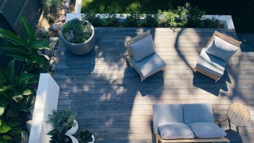 Modern Outdoor Patio with Minimalist Furniture 4K Desktop Wallpaper