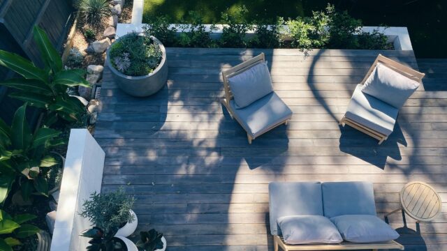 Modern Outdoor Patio with Minimalist Furniture 4K Desktop Wallpaper