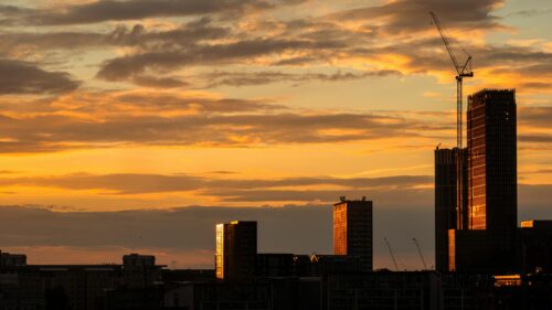 Golden Sunset Skyline with Urban Skyscrapers 4K Desktop Wallpaper