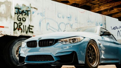 Yas Marina Blue BMW M4 Performance Car under Bridge 4K Wallpaper
