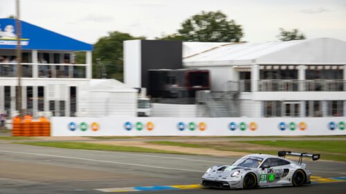 Silver Porsche 911 RSR Race Car on Track 4K Desktop Wallpaper
