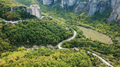 Meteora Monastery Greece Aerial View Scenic Forest Landscape 4K Wallpaper