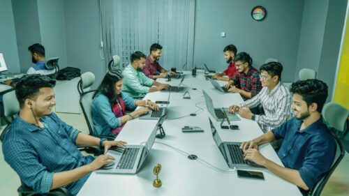 Professional Team Working Together in a Modern Office Desktop Wallpaper