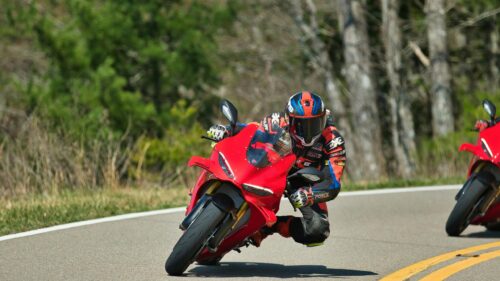 Ducati Superbike Cornering on Scenic Road 4K Wallpaper