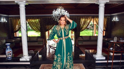 Elegant Woman in Traditional Moroccan Caftan Dress 4K Desktop Wallpaper