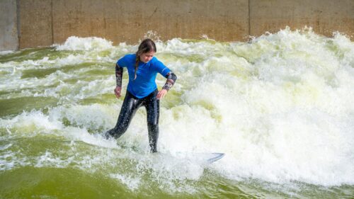 Surfer Riding the Wave Action Sports 4K Wallpaper