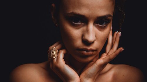 Elegant Woman With Gold Jewelry Moody Portrait 4K Wallpaper