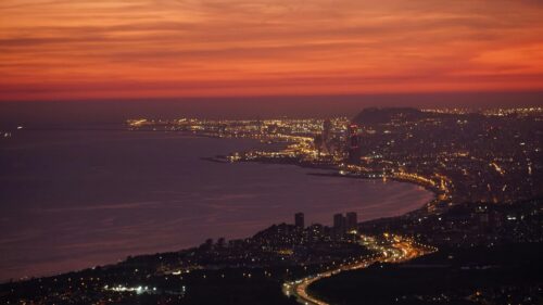 Breathtaking Sunset Cityscape Overlooking The Mediterranean Coast Desktop Wallpaper