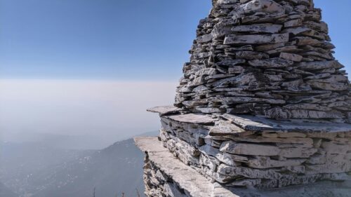 Zen Stone Stack Tower Over Misty Mountain Valley Desktop Wallpaper