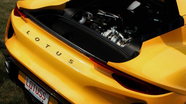 Vibrant Yellow Lotus Sports Car Rear Engine Detail 4K Wallpaper