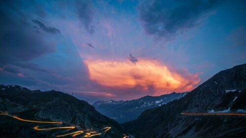 Stunning Winding Mountain Road at Sunset 4K Desktop Wallpaper