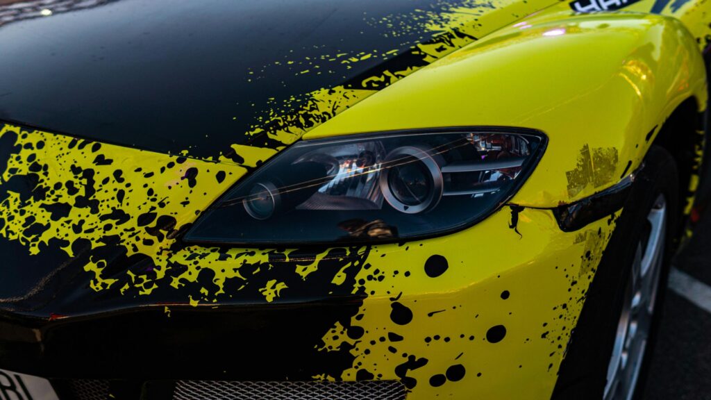 Neon Yellow and Black Splatter Mazda RX-8 Sports Car 4K Wallpaper