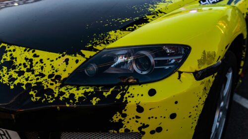 Neon Yellow and Black Splatter Mazda RX-8 Sports Car 4K Wallpaper