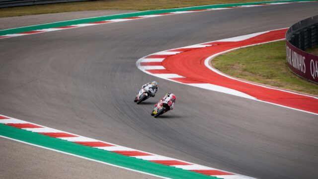 MotoGP Racing Bikes Cornering on Track 4K Desktop Wallpaper