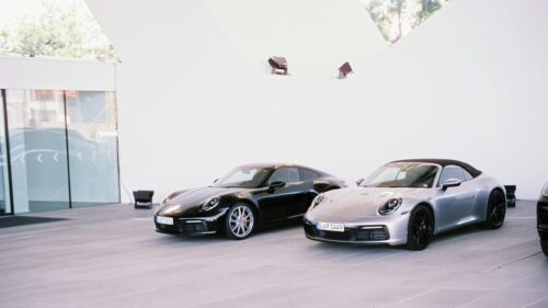 Black and Silver Porsche 911 Sportscars Side by Side 4K Wallpaper