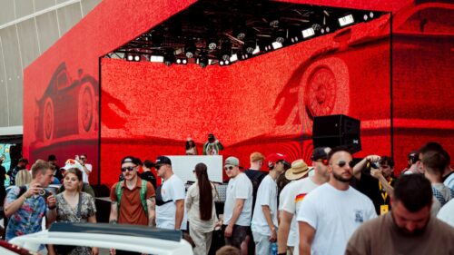 Car Enthusiast Festival Event Atmosphere Red Background 4K Wallpaper