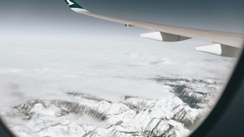 Breathtaking Aerial View of Snowy Mountain Peaks Desktop Wallpaper