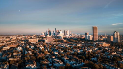 Golden Hour Houston City Skyline with Moon Aerial View Desktop Wallpaper