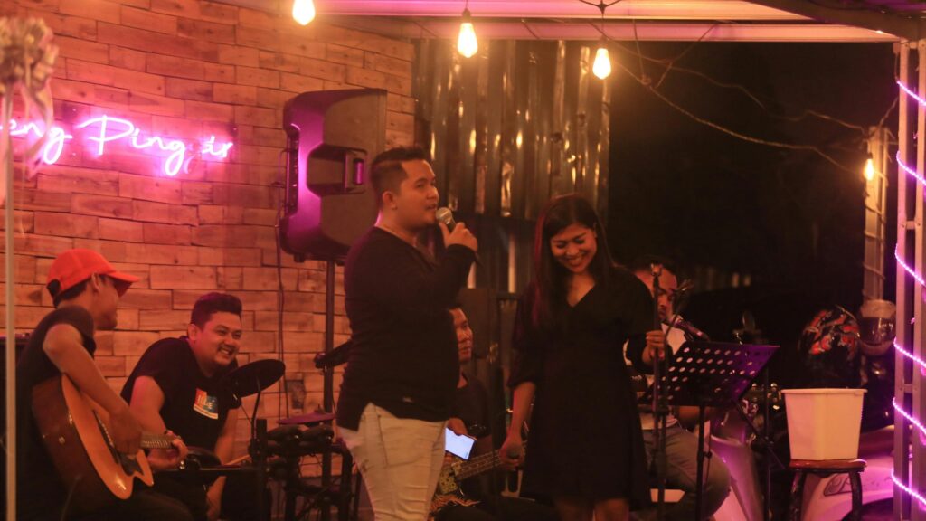 Live Music Performance with Band on Stage Desktop Wallpaper