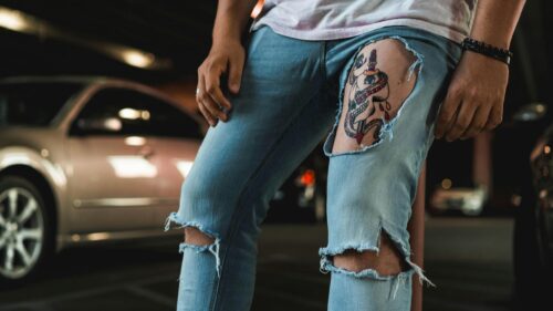 Edgy Street Fashion Skull Tattoo Detail Desktop Wallpaper