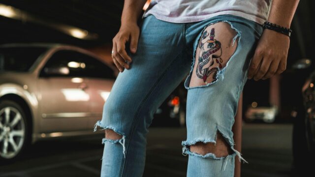 Edgy Street Fashion Skull Tattoo Detail Desktop Wallpaper