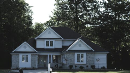 Cozy Suburban Home with Mature Trees 4K Desktop Wallpaper