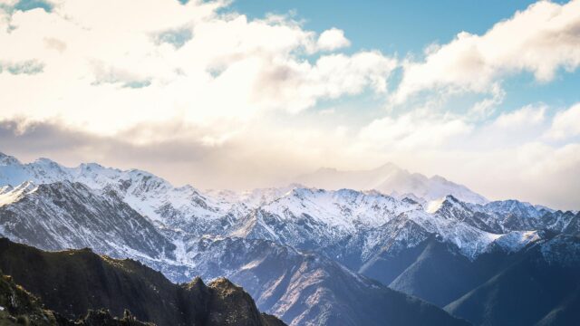Majestic Snow Capped Alpine Peaks at Sunset 4K Desktop Wallpaper