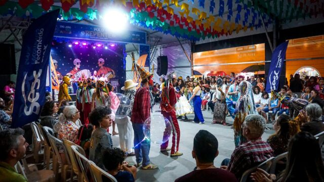 Vibrant Folk Festival Performance with Dancers and Performers 4K Wallpaper